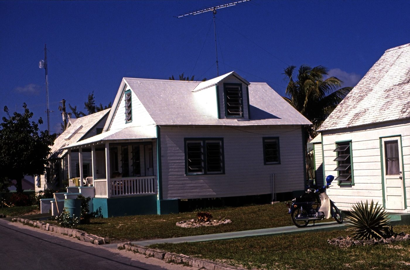 White clapboard house with a covered porch, Eleuthera